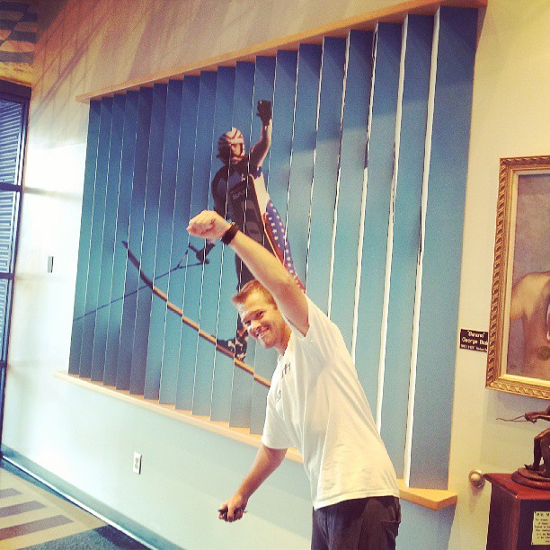 Siemers poses next to his photo on the USA Water Ski Museum